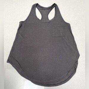Lululemon Pocket Racerback Tank Top in Black print design. Size 6